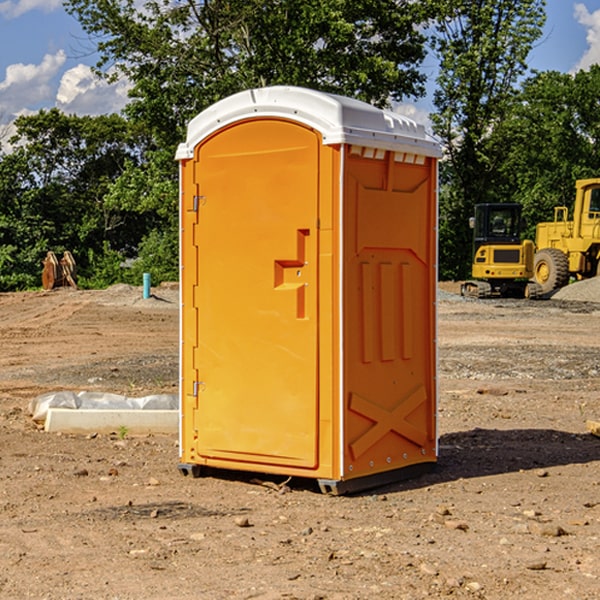 what is the cost difference between standard and deluxe portable restroom rentals in Aldrich MO